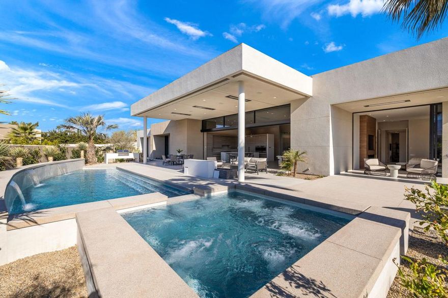Sterling Ridge is a private, gated enclave of luxury contemporary homes. NEW CONSTRUCTION - 2023 by Foxx/Curci Construction, INCLUDES OWNED SOLAR. For your clients who know what they want and know how to live. Cutting edge desert contemporary w/top of the line amenities including Wolf SubZero appliances, a substantial walk in pantry w/built in cabinetry, full size fridge & a coffee station.  This homesite offers coveted SW exposure with CAPTIVATING MASSIVE MOUNTAIN RANGE views. Cul-de-sac location, private gate leading to the motor courtyard and the FOUR car garage (appro. 1165sf) w/two AC units total. The dramatic pivot, front door entry leads to an even more impressive great room w/motorized pocket sliders, w/14' ceiling height, and a 9' custom fireplace; dining area w/ manual pocket sliders, glass enclosed wine room; step down bar at great rm. FOUR en-suite Bedrooms, incl. an OFFICE (all with access to exterior). The primary bath has two water closets, and a spa like bathroom w/sliders leading to a pvt outdoor tranquility garden. RESORT never looked so good. Covered structural overhang at patio, 36x36 flooring from interior extends to the outdoor patio. Pool/spa, custom outdoor entertainment center w/pop up TV + fireledge, recessed electric heaters, mist system. Sonos house music at interior & exterior. Call listing agent for appt & details. Offered furnished. Surrounded by Golf options: Mission Hills CC, Morningside CC, Tamarisk CC, The Springs. WATCH FOR OPEN EVENTS.