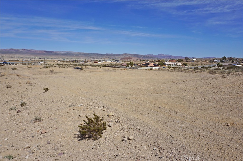 Enjoy beautiful views from all angles. 2.5 acres all to your self. This lot is situated on a higher portion of the road which makes it even better to enjoy. This property is located on the lower side of Barstow Heights. It is close to freeway access and shopping. What a great location for your dream home.