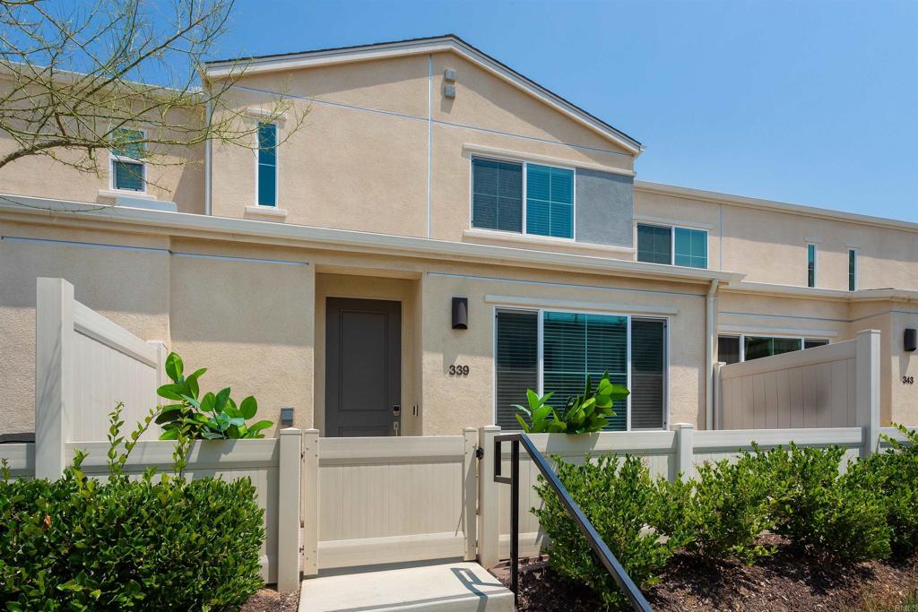 Built in 2022, this 2 bed, 2.5 bath, 1185 ESF home offers fully owned solar (no lease) and over $35K in upgrades completed from 2022–2025. Interior highlights include a bonus room, new vinyl flooring, custom backsplash, barn door, and upgraded lighting and ceiling fans in every room including the den. The kitchen features a new refrigerator and the home includes a washer & dryer—items not originally provided. The primary suite has a customized walk-in closet and added cabinetry, also found in the downstairs bath. Exterior improvements include an upgraded porch and EV charger in the garage. Modern, energy-efficient, and move-in ready!