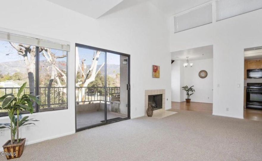 Excellent Pasadena Location!  Beautiful top-floor condo with a bright, open layout and high ceilings. This north-facing unit offers tranquil treetop views and two spacious primary suites, each with its own full bath and generous closet space. Features include an updated kitchen, dining area, living room with fireplace, private balcony, in-unit washer/dryer, and refrigerator. The gated community offers secure entry, BBQ area, and two subterranean parking spaces with ample storage. Conveniently located near the 210 Freeway, shopping, and Pasadena's finest restaurants--this is a rare find in a prime location!