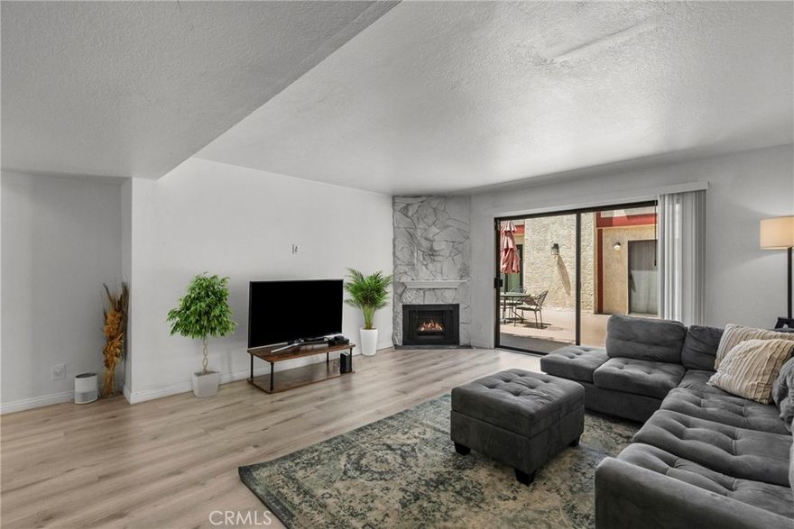 PRICE IMPROVEMENT to $610,000! LOCATION, LOCATION, LOCATION! This REMODELED 2-bedroom, 2.5-bathroom, 1,276 sq ft townhome is located in the heart of the NORTH HOLLYWOOD ARTS DISTRICT, in the prestigious MORRISON PLAZA. APPROXIMATELY 1/2 A MILE FROM TOLUCA LAKE, this highly desirable property is part of a gated community with only 12 units. It is a premium corner unit with IN-UNIT LAUNDRY, 2 SIDE-BY-SIDE PARKING SPACES in the SUBTERRANEAN GARAGE, and LOW HOA FEE. Upgrades and highlights include a Gourmet Kitchen with Stainless Steel Appliances & Tiled Backsplash, Vinyl Flooring, Spacious Primary Bedroom with En-Suite Bathroom & Double Vanities, Walk-In Closets, Fireplace, Central AC/Heat, an Abundance of Natural Light, and Direct Access to the Common Patio Area. The community is well-maintained, with recent upgrades to roof and plumbing. HOA dues cover Spectrum Internet/Cable, Water, Trash, and Grounds Maintenance—providing excellent value. Conveniently located minutes from Toluca Lake, Studio City, Sherman Oaks, Ventura Blvd, and Universal City, with easy access to the 170, 101, and 134 freeways. Fine dining, shopping, entertainment, and nightlife are nearby, making this the perfect location to enjoy everything the area has to offer. This property is a rare find in the community and has been priced to sell! ALL APPLIANCES ARE INCLUDED & SPECIAL ASSESSMENTS HAVE BEEN PAID OFF!