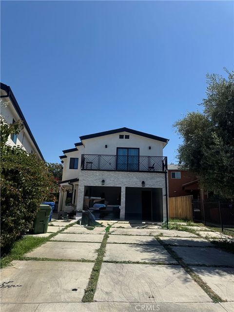 Photo of 1122 E 94th Street, Los Angeles, CA 90002 (MLS # DW26101855)