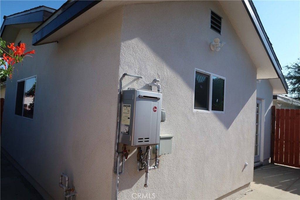 Photo of 9210 Lochinvar Dr Dr, Pico Rivera, CA 90660 (MLS # DW25244389)