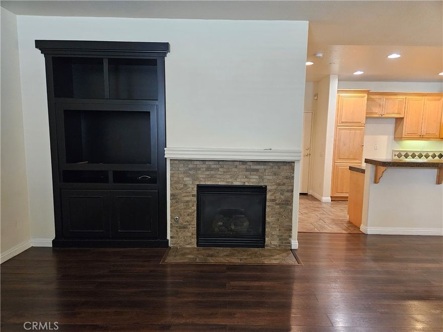 Wow, This is a wonderful two story condo with 3 bedrooms and 2.5 bathrooms in a spacious 1,530 square feet. Come live in the well managed and family friendly Crystal Lane community. Newer wood floor on entire house except kitchen and bathrooms. The kitchen features granite countertops, lots of maple cabinets. Enjoy the inside laundry included washer & dryer and attached 2 car garage with direct entry into the home. Community includes parks, clubhouse with swimming pool, toddler pool, barbeques and relaxing spa.