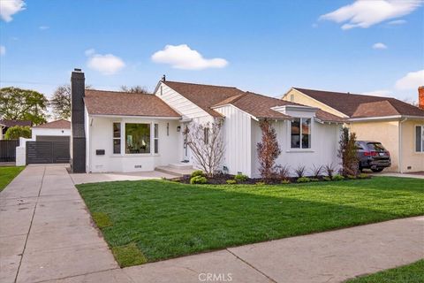 Photo of 3825 Edgehill Drive, Los Angeles, CA 90008 (MLS # IG26076362)