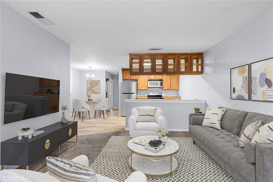 Discover easy living in this move-in ready 3-bed, 2-bath first-floor condo in a gated community near CSUC. Enjoy the convenience of in-unit laundry with included washer, dryer, and refrigerator. The stylish kitchen features granite counters, stainless steel appliances, and LVP flooring, opening to the living and dining areas with a large breakfast bar. Both bathrooms offer tile floors and granite counters. Relax on the private patio with storage, and benefit from 2 assigned parking spaces. The HOA covers water, sewer, garbage, pool, landscaping, exterior maintenance, & exterior insurance. A fantastic opportunity for affordable, move-in ready living close to Chico State, shopping, and restaurants in Woodland Commons. Recent upgrades include high-quality VLP flooring in the kitchen, dining, and hall, plus high-quality carpet in the living room and bedrooms. The water heater was replaced in 2020.