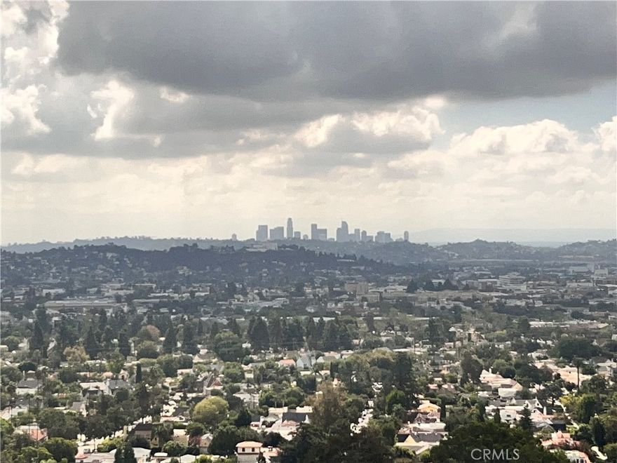 Sprawling one story mid-century home with infinite views located in a very private setting in Glendale hills. This single family home is situated at the end of a cul-de-sac offering intimacy in a secure and private setting. Great home to scape to or entertain guests. The yard features a sparkling pool, outdoor grill, and uninterrupted views of downtown LA and Glendale. Minutes away from most major studios, Pasadena to the East and Burbank to the West. Open floor plan. Hardwood floors throughout. Updated kitchen and bathrooms. Central AC/Heat. Views from every room. The very private Primary Suite features a walk-in closet and a jetted tub. Two car attached garage and additional available parking in the front. California living at its best.