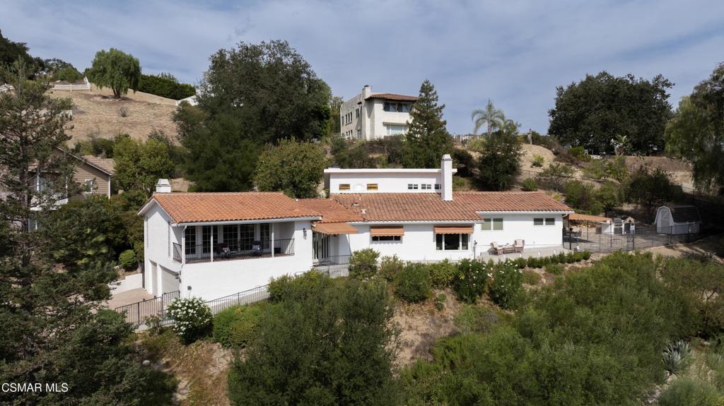 Perched on a serene hillside in Agoura Hills, 28329 Foothill Drive tells a story of transformation and refined California living. Over the past ten years, this 1/2 acre, 4 bedroom, 3 bath, 3,850 sq ft residence has undergone a remarkable evolution--thoughtfully enhanced to blend modern luxury with everyday comfort. As you step inside, you're welcomed by open, airy living spaces drenched in natural light, where panoramic views frame nearly every key room. The open floor plan seamlessly connects the living, dining, and kitchen areas, perfect for both intimate gatherings and grand entertaining.The heart of the home--a fully remodeled kitchen--features top-of-the-line stainless steel appliances, custom cabinetry, and sleek quartz countertops. No detail has been overlooked, from smart home features and upgraded recessed lighting to designer style and well finished flooring throughout. Each bathroom has been tastefully reimagined with contemporary finishes, and the spacious primary suite offers a peaceful escape with fireplace and tranquil setting. Outside, enjoy undisturbed mornings or have an evening wine with expansive views overlooking the Santa Monica Mountain range. This is more than a home--it's a carefully curated lifestyle upgrade, the result of nearly a decade of care, investment, and vision. Proximity to scenic trails, top-rated schools creates a lifestyle that's both tranquil and connected. Welcome home to Old Agoura--where every day feels like a getaway. Come experience the beauty and the story of 28329 Foothill Drive. To view all disclosures and inspections: https://app.disclosures.io/link/28329-Foothill-Drive-m15wucnj