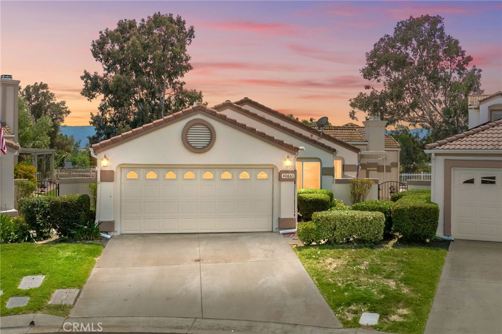 Welcome to your dream home in the highly sought-after 55+ guard-gated community of The Colony in Murrieta, CA! This beautifully upgraded 2 bedroom, 2 bathroom residence offers a rare and spacious layout, featuring a fully permitted great room that sets it apart from any other home of its model. Brand new carpet, new window screens throughout, freshly painted AND new dishwasher and mini wine fridge. Tucked away on a quiet cul-de-sac and backing directly onto the lush fairways of the California Oaks Golf Course with sunsets skies that will cause you to pause, this home offers privacy, serene views, and a lifestyle of comfort and relaxation. The expanded great room creates a light-filled, open-concept living space ideal for entertaining or simply enjoying peaceful evenings with a view. The primary suite is generously sized, complete with an en-suite bath and ample closet space. A second bedroom and full guest bath provide flexible space for visitors, an office, or hobbies. You’ll appreciate the thoughtful layout, with seamless indoor-outdoor flow and low-maintenance living. Located just minutes from shopping, dining, medical facilities, and convenient freeway access, this home combines resort-style living with everyday practicality.