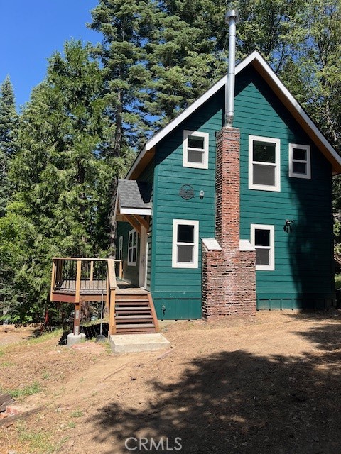 Escape to the tranquility and embrace the beauty of nature in this newly constructed mountain cabin. This stunning three bedroom two bath home offers the perfect blend of modern comfort and rustic charm, promising an unparalleled lifestyle amidst breathtaking views. Level entry and off street parking provides for easy access in all weather conditions.
Be the first to enjoy this brand new cabin, meticulously crafted with high-quality materials and finishes. Relax while dining outside on the low maintenance trex deck during the summertime and cozy up to the wood-burning fireplace in the living room during the wintertime.
Located in a desirable mountain community, you'll enjoy both the serenity of nature and easy access to local amenities, shops, and attractions. This home has been constructed with the most up-to-date and code compliant materials to provide a low maintenance lifestyle for years to come.