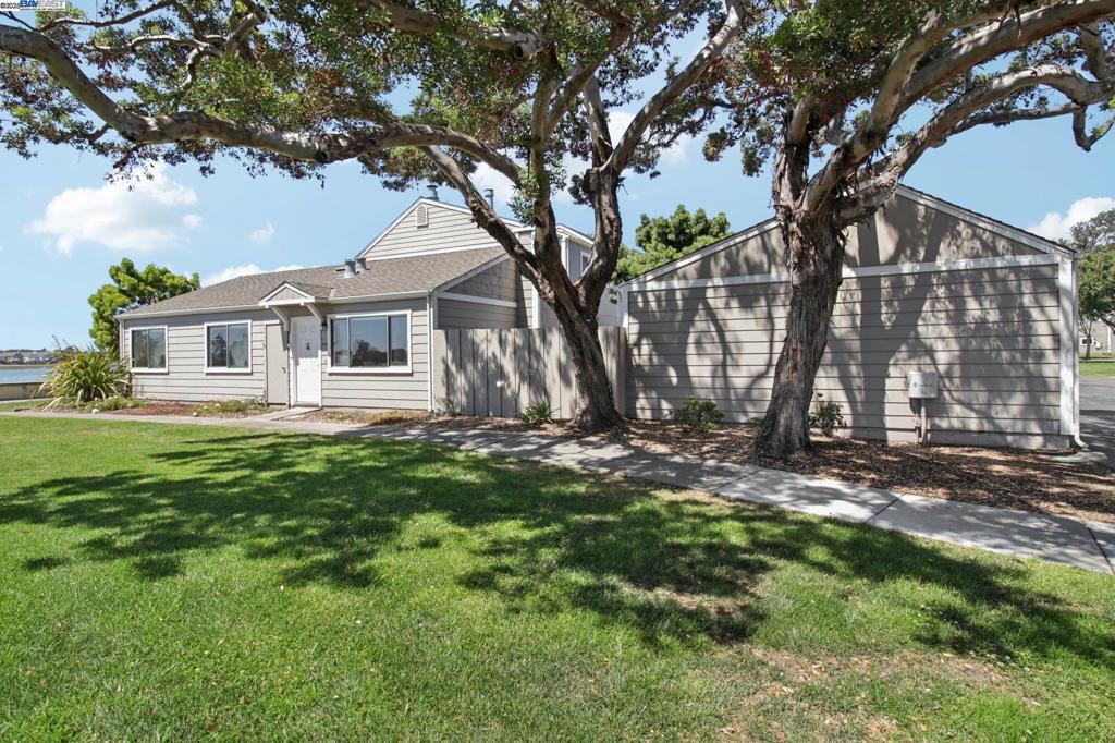 Open 8/16 Sat 2-4pm & 8/17 Sun 2-4pm. Beautifully updated single-level 3BD/2BA townhome in Alameda’s East End/South Shore neighborhood. This 1,040 sq ft home features a freshly painted interior, brand-new luxury vinyl flooring, and an open, light-filled layout with peaceful greenbelt and water views from nearly every room. The kitchen includes Corian countertops and plenty of storage, while both bathrooms are upgraded with quartz countertops. Enjoy your own private patio, a spacious 2-car garage, and direct access to a scenic waterfront trail leading to Robert W. Crown Memorial State Beach. The Ravens Cove community offers a pool and clubhouse. Conveniently located next to South Shore Center, and close to shopping, schools, public transit, ferries, and tech shuttles to SF, Oakland, and Silicon Valley. A rare blend of comfort, convenience, and coastal living in one of Alameda’s most desirable areas.
