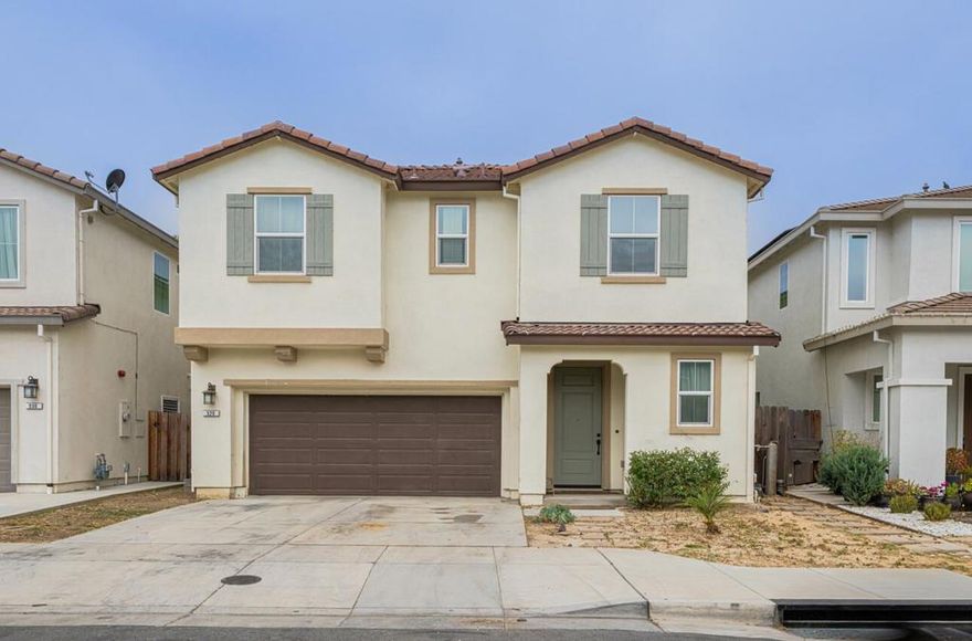 Welcome to this spacious 4-bedroom home located in the charming city of Hollister. With a total area of 2,114 square feet, this residence offers ample living space for you and your family. The kitchen is a true highlight, featuring granite countertops, a gas oven range, a convenient island, dishwasher, and refrigerator, making it perfect for culinary enthusiasts.   Inside, you'll find comfortable laminate and carpet flooring throughout, adding warmth and character to each room. The cozy living room includes a fireplace, ideal for relaxing evenings. The dining area is conveniently located within the living room space, allowing for seamless entertaining.  This home also includes an upper-floor laundry area, providing ease and efficiency. The property is situated within the Hollister Elementary School District, offering educational opportunities for young learners. Additional amenities include a 2-car garage and central forced air heating. Don't miss the opportunity to make this Hollister home your own!