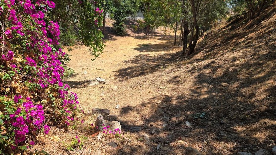 Build your dream home :) on this 7,493 sq ft Lot. Don’t miss this incredible chance to own land in one of LA’s most desirable and connected neighborhoods. Peaceful hillside setting with natural surroundings and hill views. Preliminary Designs, Geology and Soil, Geotech Report, Grading and Drainage plan and Hydrology Analysis have been done and can be provided. Plans include to construct an new 3,426 sq ft, 4 Bedroom - 4 Baths, 2 car garage home.