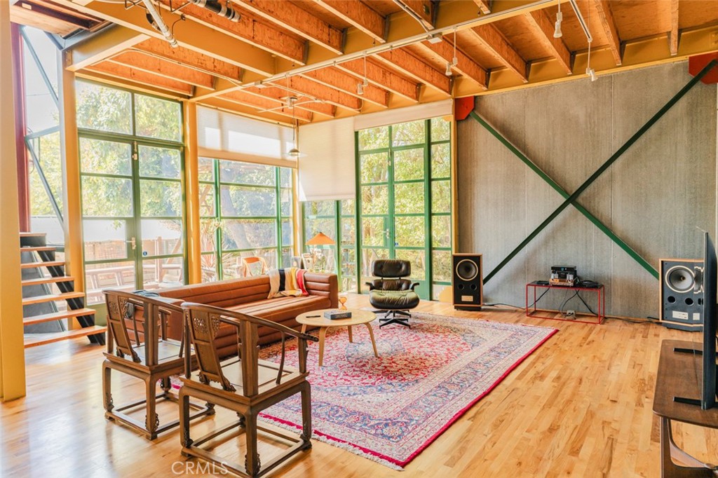 Come experience this modern industrial residential masterpiece by award-winning architect, David Ming Li. This 3-bedroom, 2-bathroom, 3-story home can be utilized as a creative space, an office, tech startup, or production studio. Located in the desirable Sawtelle neighborhood, this home is conveniently located within walking distance to Sawtelle Japantown, close proximity to the beach, and near many more LA attractions. The private yard includes a wooden deck and a teahouse, and the home is set back from the street. The 2-car garage has 14' ceilings and an industrial roll-up door. There is a basement, solar panels and storage. This property comes FULLY FURNISHED.