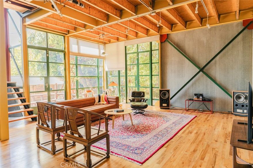 Come experience this modern industrial residential masterpiece by award-winning architect, David Ming Li. This 3-bedroom, 2-bathroom, 3-story home can be utilized as a creative space, an office, tech startup, or production studio. Located in the desirable Sawtelle neighborhood, this home is conveniently located within walking distance to Sawtelle Japantown, close proximity to the beach, and near many more LA attractions. The private yard includes a wooden deck and a teahouse, and the home is set back from the street. The 2-car garage has 14' ceilings and an industrial roll-up door. There is a basement, solar panels and storage. This property comes FULLY FURNISHED.