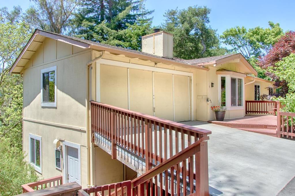 Wonderful opportunity...... Well built home..... Make it your own before moving in, or, while living in it. Located in beautiful Mount Hermon Park on a large sunny lot, perfect for gardening and fruit trees. Spacious 2-level floor plan with open kitchen to dining/family room, 1/2 Bath, and formal living room with fireplace, all at street level entry. Below are 4 large Bedrooms, 2 Baths and Laundry. Great location! Only minutes away from Dining and Shopping in Felton and Scotts Valley. For commuters, 12 minutes to Hwy 17. Downtown Santa Cruz, Boardwalk, and Beaches are only 15 minutes away. Cost effective Tesla owned Solar system ($104/mo.). Somewhat a "fixer" due to deferred maintenance. Spackle and Paint will enhance the interior walls, as well as new flooring in carpeted areas (stairwell, baths and bedrooms). Please see inspection reports for structural comments....a supplemental page mentioning items already addressed will be provided. New Septic Tank just installed and system ready. Many opportunities are available living in Mount Hermon Park, which is NOT an HOA. There is a $550 annual fee for Roads, Trails and Bridges maintenance . Large storage area under home and "artist" studio behind. Maybe not Perfect now, but Loads of Potential!....."Opportunity Knocking".