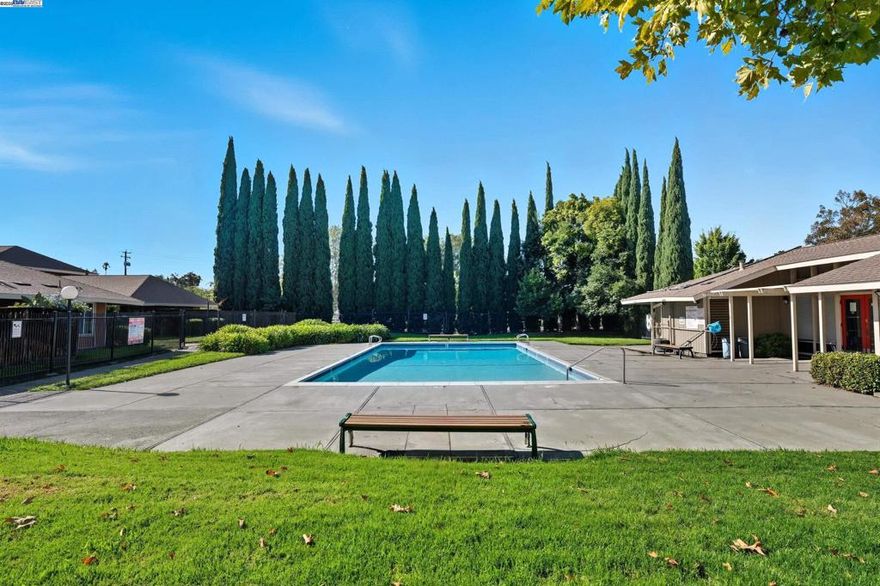The complex is beautifully landscaped with well-maintained greenbelts and a community pool. It’s conveniently located near parks, schools, Highways 242 and 4, and the North Concord BART station. Commuters will appreciate the easy access to BART and public transportation, while outdoor enthusiasts will enjoy the proximity to parks, playgrounds, and green spaces. Hillcrest Community Park expands across 26 acres with many picnic areas, athletic fields, BBQ sites and more! When it’s time to cool off, head to the renovated community swimming pool, perfect for sunny days and summer fun. This is an excellent opportunity to own a home in the heart of Concord, with everything it has to offer!  Recent same model home closed on 2/13/25 for $376,865. Parking space #423 (right next to the kitchen entry).