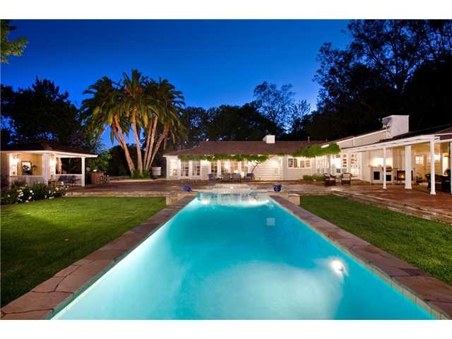 Perched on a incredible RSF Golf Course View lot in the Covenant. Walk to RSF Village and school. This perfect 1 level, traditional ranch style home has more charm & tranquility than one could imagine. Both the main house & the guest house overlook the picturesque 40 foot garden pool. Also, outdoor pool bath, built-in BBQ, guest house with private bedroom and bath, another room for crafts or office. Dedicated private golf cart path to the RSF Golf Course & a golf cart garage. Neighborhoods: The Covenant View: Parklike Sewer: Sewer Connected
