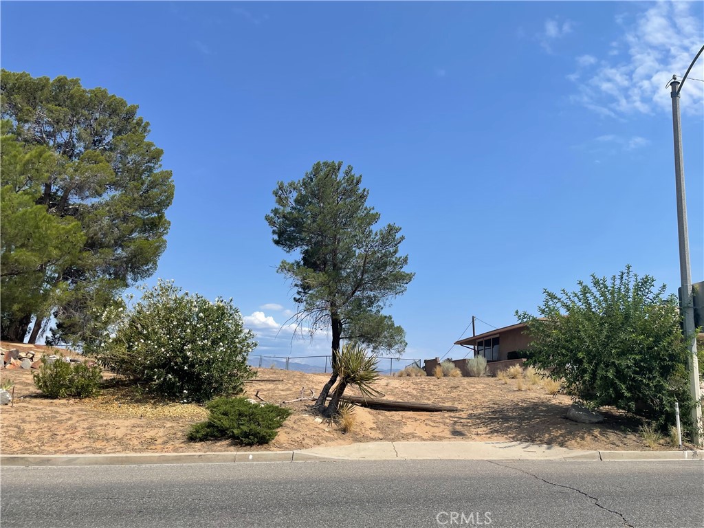 This 1.55-acre parcel is a rare opportunity to own in one of Victorville’s most historic and elevated neighborhoods. This lot offers a gated entry and driveway, gentle rolling terrain, and beautiful desert views. This lot is ideal for a custom home or investment. Located next to 14657 Rodeo Dr. Utilities nearby (buyer to verify). A short drive to Spring Valley Lake, major highways, shopping, and schools. A piece of High Desert history with modern potential!
