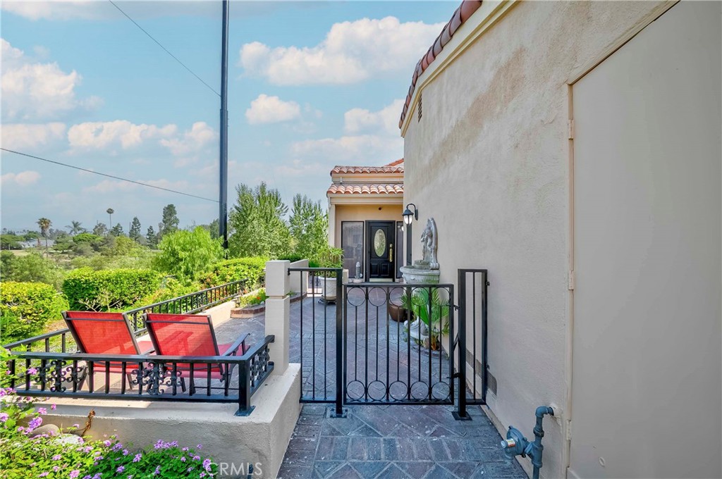 Unique Prime Location w/Panoramic Golf Course & Mountain Views – Exceptional Privacy!
24/7 guard-gated town home. locates center of the community—far from busy streets.
2126 sqft. 3-beds, 3-baths features w/ loft, vaulted ceilings, & oversized windows & doors.
Resort feel: golf course, mature trees, year round flowers.
In the winter, surrounding snow-capped mountains, rainy days w/beautiful river course flows through scenery and widely open views are enhanced as tree leaves drop.
The recent updated home w/ open floor plan boasts new PVC flooring, new paint, glass doors & cabinets, LED recessed lights moldings.
The kitchen & bathrooms feature brand new quartz stone countertops, sink etc. Samsung stainless steel appliances.
Short-split staircase,5 steps down to the main level: living room offers upgraded two sliding patio doors, a unique extra-large window w/ dual glasses, decorative wood shelves, cabinets, fireplace. Newly widened wall opening between dining, kitchen, living area creates brighter, open flow feel. Kitchen pantry w/ glass door, drawers & pull out selves. This level has 1 bedroom,1 bath, storage, laundry.
Upstairs,9 steps up from entry: large loft w/ wood columns, vaulted ceilings, many windows invites sunlight & views—perfect for office, den, library, or playroom. The loft connects to the master suite through double entry doors.
Unique customized like art work, master suite w/ craftsman made wood beam ceilings, built in decorative wall features, walk-in closet w/cedar lining, built-in organizers, bathroom w/dual sinks,spacious bath tub w/ shower. Rare spacious balcony w/ panoramic views.
Has 2nd bedroom: closet w/ built in organizer, & a bath next.
The scenery exterior w/ rare spacious front, side, & back yards, feel like a single-family home. Unique private iron gate, fencing, stucco walls, & brick flooring.
2 car garage w/ separate entry from main home entry, rare large attic storage area, upgraded built-in desk, cabinets, EV charger.
Tucked away at the end of the street, right next to the golf course w/ maximum privacy-no walking paths, parking lots or facing neighbors-is unique gem.
Village includes 2 pools & spas, clubhouse, tennis & pickleball courts, basketball, RV parking, scenic walking trails. Fullerton school district: CSUF, Award winning Beechwood. Medical centers, Sports Complex (just across the street), shopping, dining, golf and more.