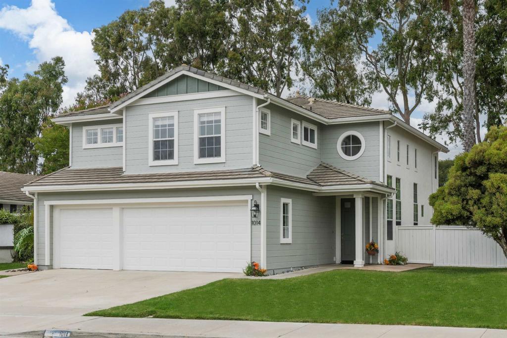 Nestled in the heart of Carlsbad, this charming Cape Cod 4-bedroom, 3-bathroom offers the perfect blend of classic style and modern comfort. Boasting 2,583 square feet of living space, this two-story beauty features spacious interiors and timeless architectural details throughout. Step inside to discover a bright and airy open floor plan, with a large living room that seamlessly flows into the formal dining area—ideal for entertaining. The light and bright kitchen, designed with functionality in mind, offers ample cabinetry and seamlessly connects to the family room—making it easy to cook and socialize. A cozy fireplace in the family room adds a touch of warmth, creating the perfect spot to relax. Upstairs, you'll find the primary suite with vaulted ceilings, stunning views spanning over the park, and a newly renovated private en-suite bath, with a walk-in closet. Three additional generously sized bedrooms offer plenty of room for family or guests, as well as a bonus living area and laundry room. Outside, the beautifully landscaped backyard provides a serene retreat with a patio area, perfect for outdoor dining or lounging in the California sun. The home also features a spacious 3-car garage and additional storage space. The location is unbeatable— walking distance to the community pool, spa, sport court, Poinsettia Park and Pacific Rim Elementary, and easy access to Carlsbad’s beaches, shopping, dining, and major freeways. Whether you’re looking for a place to call home or a coastal getaway, 1014 Beacon Bay Drive offers the perfect setting for Southern California Living.