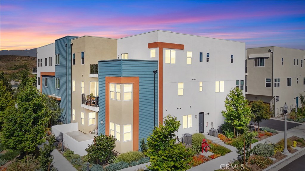 ***PRICED TO SELL*** Rare corner unit with private street entrance and no neighbors above or below, this 3-bedroom + loft (optional 4th bedroom) gem offers over 2,600 sq ft of modern living. Flooded with natural light, with two private balconies, luxury waterproof flooring, high ceilings, quartz countertops, stainless steel appliances, and paid solar meaning lower energy bills.
Main level includes a guest suite and direct access via garage; top floor boasts the spacious primary suite, loft, extra bedroom, full bath, and in-unit laundry. Outside, enjoy an extra storage room just off the lobby, plus community resort-style amenities—pools, pickleball, parks, trails—all within walking distance of Solis Park K-8, Portola High, and shopping.
Seller is very motivated and open to all offers. Furniture & decor can stay if desired. This is one of the rare turnkey offerings in one of Irvine’s most sought-after communities. Call for your private tour before it’s gone.