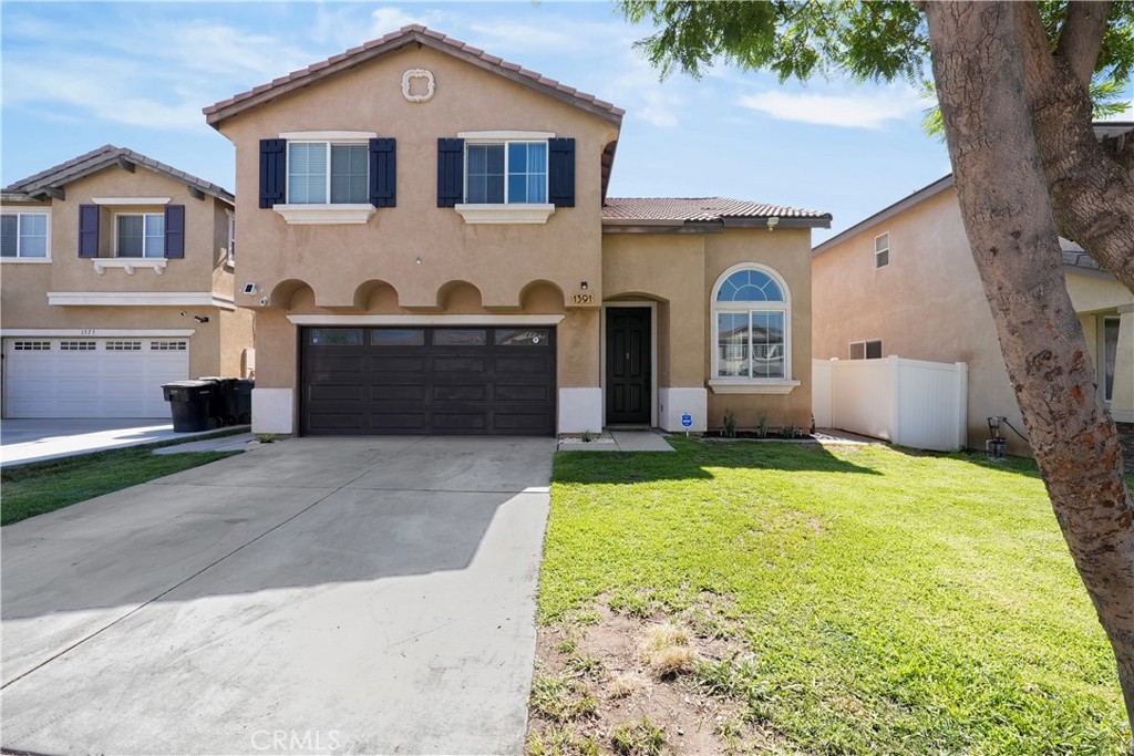 This well-kept home shows pride of ownership with fresh paint in select areas and kitchen cabinets that have been nicely updated. The bedrooms are a good size and offer plenty of comfort.
Inside, you’ll find multiple living spaces, a front living/dining room with high ceilings and lots of light, a family room with a cozy fireplace, plus a loft that makes a great extra hangout, office, or study area. There’s also a dining area off the kitchen, giving you plenty of room to spread out.
A small corner of the garage has been customized into a bonus barber station — a nice touch for barbers, cosmetology students, or anyone wanting a creative space for side work or social media filming. If preferred, the garage can easily be converted back. Top-bottom window shades throughout add a practical and stylish finishing touch.