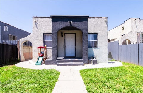 Photo of 1455 W 60th Street, Los Angeles, CA 90047 (MLS # DW26141356)