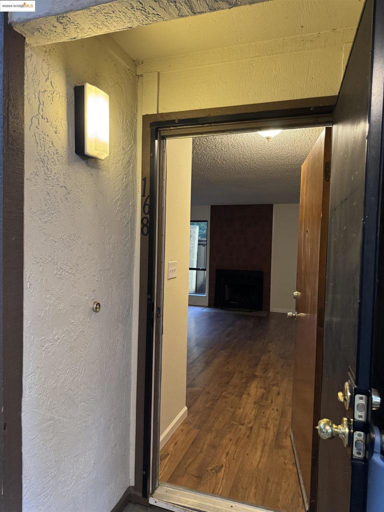 Adorable 2 bedroom, 2 bath, ground floor condo is waiting for its new owners. The unit is move in ready and includes updated kitchen appliances, updated bathrooms, in unit washer/dryer combo, refreshed paint and newer carpet in the bedrooms. Community features include a covered parking space, security gate and a pool. HOA fees cover water, sewer and garbage for both common areas and usage by residents. This home is perfect for a first-time home buyer. Why rent when you can own?