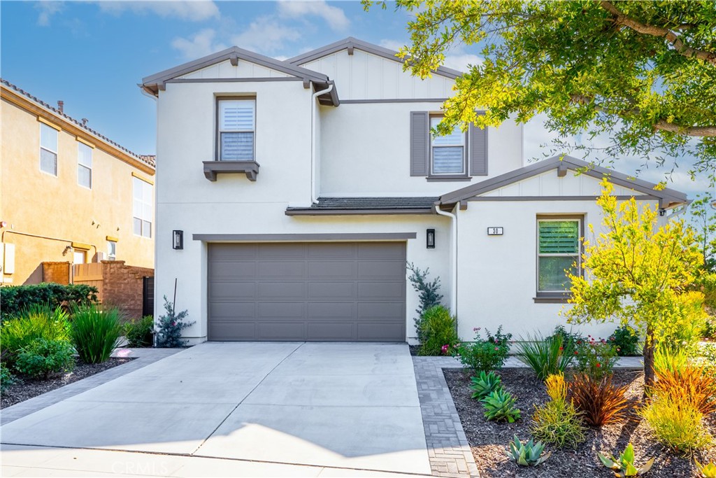 Looking for a view home in the award-winning community of Rancho Mission Viejo? Tucked away on a quiet cul-de-sac in Sendero, this incredible view home sits on a rare ultra-wide, pool-sized lot and offers both privacy and sophistication. With a highly functional open floor plan, the home features 4 bedrooms plus a spacious loft including a desirable main-floor bedroom with its own private bath. The loft upstairs adds versatility, perfect for a home office, media room, or play space. The gourmet kitchen is a showpiece with sleek European quartz countertops, KitchenAid Pro appliances including double ovens and a 6-burner cooktop, and crisp white shaker cabinetry surrounding a large island ideal for gathering and entertaining. Rich light oak hardwood floors, custom built-in cabinetry framing the fireplace, a stylish butler’s pantry, wrought iron staircase, and home theater surround sound in the great room all speak to the thoughtful upgrades throughout. Retreat to the primary suite, where a one-of-a-kind granite vanity, expansive walk-in closet, and spa-inspired bath with a soaking tub perfectly positioned to take in the views create an inviting sanctuary. The outdoor spaces are equally impressive, with professional hardscaping that includes a built-in BBQ, refrigerator, and cozy firepit to enjoy stunning sunsets. The California room extends the living area outdoors, providing a shaded retreat to sip coffee or watch kids play in the expansive yard. For future possibilities, the utilities for a pool have already been installed, making this property not only beautiful but primed for your dream backyard. Exclusive to Rancho Mission Viejo residents are all amenities in the Villages of Sendero, Esencia, Rienda and future Villages. There are community amenities for all from breath-taking resort-style pools and spas, Esencia school K-8, community farms, fitness centers, guest house, putting green, bocce ball courts, tennis and pickle ball courts, playgrounds, coffee shop, fire pits, an arcade and so much more!