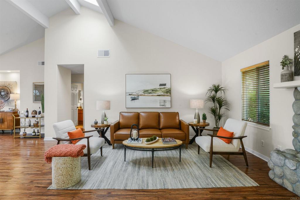 The perfect blend of privacy, comfort, and upgrades—all under one roof. This 5-bedroom, 4-bath retreat is designed for comfort and flexibility, featuring two primary suites—one on the main level and one upstairs—perfect for multi-generational living, visiting guests, or extended family. Over the years, the owners have invested in extensive updates to ensure lasting quality and modern convenience. Highlights include: a 50-year cool roof for energy efficiency, remodeled bathrooms, a refreshed kitchen, newer flooring, LED lighting, and freshly painted interior and exterior. Major system upgrades such as new HVAC units for both levels, a tankless water heater, upgraded electrical, and 16 new dual-pane windows bring peace of mind. The home’s charm continues outdoors, where the backyard has been reimagined as a private sanctuary. With new fencing, irrigation, lush landscaping, and multiple skylights flooding the interior with natural light, this home blends easy everyday living with a sense of retreat. If you’ve been searching for a move-in ready home that offers space, privacy, and upgrades you don’t have to think twice about, this one is a must-see.