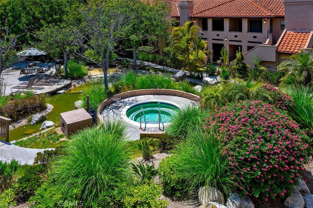 Welcome to beach living...Your upper unit has no one above you. Fantastic view from the living and dining areas is of the main pool, spa, and meandering bubbling stream with beautiful landscaping. You will have easy access to Pool/Spa, Club House, Private Garage plus 1 parking spot. The location is private and also light and bright with ocean breezes. Enjoy vaulted ceilings and a very inviting private balcony that gives you the feeling of spaciousness and outdoor living. Two primary bedrooms with their own baths. Kitchen has a Gas stove, stainless kitchen sink and faucet, washer & dryer inside the unit and also refrigerator are included for your use. Nicely upgraded throughout with hard surface flooring throughout. This beautiful condo has easy access to all San Clemente has to offer: Close to World Class Beaches, Historic San Clemente pier, Parks, Hiking and Bike Trails, Golf Courses, Shopping, Downtown and Restaurants. Close to schools and easy freeway access.