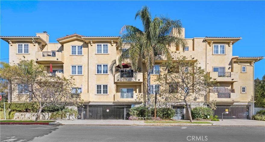 NEW PRICE! READY TO MOVE IN! Penthouse condo in prime Studio City has been freshly painted with newly installed carpets in both guest bedrooms. Overlooking tranquil mountain views from almost every room, this amazing 1880 sq foot three-bedroom two bath corner penthouse unit leaves nothing to be desired.  This is one of two penthouses in this lovely 8-unit building. Light and bright interior boasts open concept living with high ceilings, handsome dark wood flooring and recessed lighting. Entry leads to spacious sectional sized living room with fireplace and balcony with mountain views.  Breakfast counter between living room and kitchen offers the perfect spot to enjoy that morning cup of coffee.  Large dining area adjacent to living room features 12-foot cathedral ceiling with more mountain views from window.  Additional room off living room is great for family room, office or game room to complete your ideal living space.  Happy cooking in this spacious gourmet kitchen with an abundance of beautiful wood cabinets, stainless double sink, ebony counters, and stainless appliances including refrigerator, and Viking stove, hood and dishwasher. Expansive primary suite with mountain view, large walk-in closet, luxurious soaking tub, dual sinks and separate glass enclosed shower is privately located on one side of unit.  On opposite side there is a full bath and two more bedrooms.  Enjoy “Sunset Sips” on Juliet balcony in one of the two additional bedrooms and mountain views from bedroom three.  Stacking washer and dryer in unit. Controlled access to building, elevator, and secure gated parking with 2 side by side assigned spaces.  Guest parking available. All of this plus common rooftop area with panoramic views.  Convient to freeways, restaurants and shops on Ventura Blvd. A real Studio City Gem!