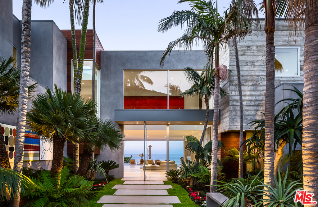 Located on the oceanfront bluffs of the exclusive MariSol community, this unbelievable modern home graces Malibu w/ amazing whitewater & island views. Just a short drive from Santa Monica via scenic highway 1 & conveniently adjacent to the private jet center, this 7bd, 11ba home will truly appeal to the most discerning buyers. The dramatic entrance is flanked by tropical landscaping & art that reveals wide walls of glass opening out to a stunning infinity pool. This jaw-dropping home also includes your own private sandy beach, roof-top putting green, outdoor cabanas, movie theater & gym. Most contemporary homes rely on bold forms & stark spatial relationships; this home dares to peel back its silky skin to reveal muscular board formed concrete walls to remind the visitor that at its heart, this home is a structure for living & not just a sculpture to inhabit. As soon as you pass through the gates you'll discover this world of privacy & tranquility - your own personal paradise.