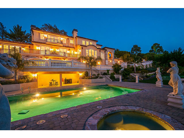 Regally situated on a cul-de-sac lot of just over 2 acres w/incredible western hills views, offers nearly 7,000 s.f. of luxurious living space. Featuring a grand formal entry w/dramatic staircase, elegant formal rooms, 6BR/6.5BA, stunning kitchen/great room ensemble, media room & wine cellar. The grounds are equally impressive with a pool, spa, tennis court, putting green, fruit orchard & vineyard