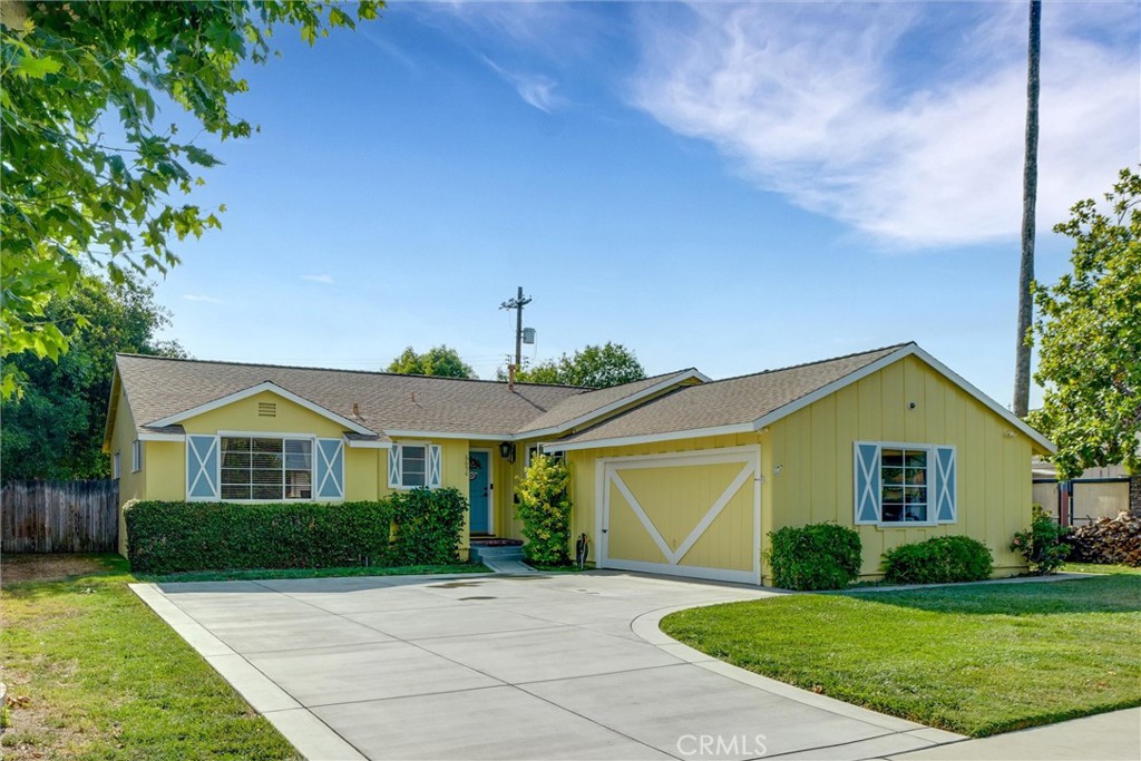 Discover your dream home; a charming 4 bedroom, 2 bath in this highly desirable West Hills neighborhood. Newer cement driveway provides expansive parking in addition to a two-car garage with workbench and sink. Energy-efficient solar panels add to long-term value and sustainability.
The living room features a fire place, large windows and a sliding glass door to the backyard that fills the space with natural light. The formal dining area opens to the kitchen with generous storage. The full-sized utility/laundry room has gas dryer hook up and a door that leads to side yard.
The hallway bathroom features tile counter top with a double sink vanity and shower/tub. The primary bedroom offers ample closet space. Bedroom 3 could be used as an office featuring a custom built-in bookcase and desk which overlooks the window to the backyard. Bedroom 4 has plenty of closet space and ensuite bathroom with shower and vanity. Hardwood flooring in entryway, hallway and all 4 bedrooms gives this home a warm, cozy vibe.
The good-sized backyard is easy to maintain and perfect for entertaining. Enjoy a covered patio and a lush grassy area, perfect for barbeques, relaxation and outdoor fun.
Located near top-rated charter schools, cultural attractions, adjacent to upscale dining/shopping at the Westfield Topanga Mall & Village, LA Rams headquarters and practice fields, and the 101 freeway, this home is walking distance to popular Shadow Ranch Park.