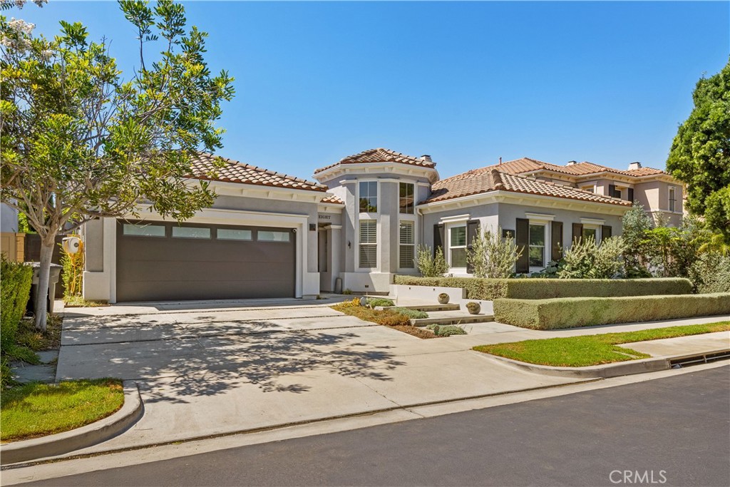 Welcome to this fully renovated, single-level luxury residence in the prestigious, guard-gated Bonita Canyon community of Newport Beach. Thoughtfully reimagined with an open floor plan and modern finishes, this home showcases effortless indoor-outdoor living through three expansive folding glass doors in the breakfast nook, family room, and primary suite—each opening to serene canyon and city light views. Bathed in natural sunlight from five strategically placed skylights, the home feels light, airy, and welcoming throughout the day. The chef’s kitchen features a premium Sub-Zero double French door refrigerator, while each bedroom and the garage are outfitted with high-quality California built-in closets for exceptional organization. The garage also includes extra built-in cabinets and ceiling-mounted racks, offering abundant storage solutions. Technology meets lifestyle with a full Savant smart system that allows you to control indoor and outdoor lights, TVs, stereo, and the security system, all from your phone. Automatic curtain controls, smart toilets, Solar Panels, Car Charger, the e-locks on both the front and side gates provide remote and fingerprint access for seamless entry. Elevate your lifestyle with this stunning residence, experience the ultimate in luxury and convenience and enjoy the best of Newport Beach living. The living room, master bedroom and master bathroom lighting fixtures are replaced with something similar as they were gifted to the property owners. Sustainability and efficiency are at the heart of this home, with solar panels significantly reducing or eliminating electric bills and a dedicated Tesla car charger in the garage. With the ocean breeze flowing through Bonita Canyon, air conditioning is rarely needed—yet always available for comfort. Step outside to two newly added glass-enclosed patios, complete with heaters and curtains, ideal for year-round enjoyment and elegant entertaining. Located in one of Newport Beach’s most convenient and desirable areas, this home offers quick access to major freeways including the 405, 73 Toll Road, 55, and 22. You're just minutes from the ocean and world-renowned Fashion Island -It’s the perfect setting for outdoor lovers and those who value both convenience and privacy. This rare offering combines luxury, smart home innovation, and an unbeatable location—don’t miss your opportunity to experience Bonita Canyon living at its finest.