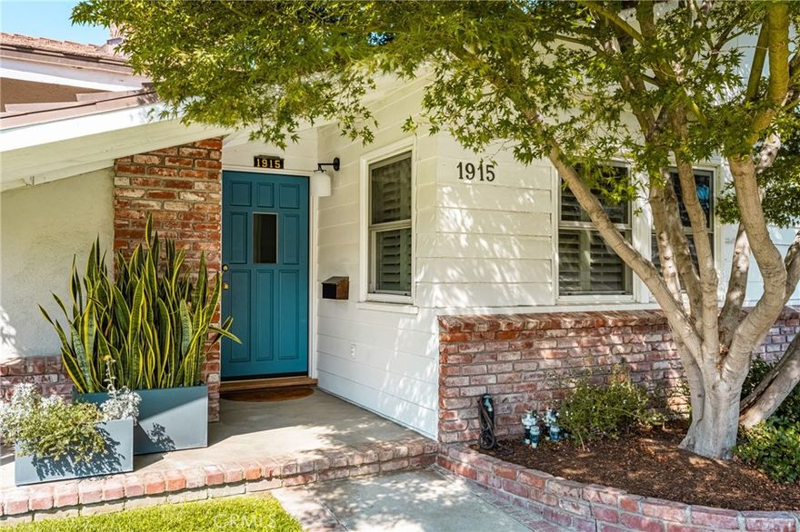 Experience the charm of Orange living at 1915 E Almond, a home designed for comfort, style, and convenience. This impeccably renovated 3-bedroom, 2-bath residence is situated beautifully on a large lot and showcases high-end upgrades and thoughtful design throughout. The fully renovated kitchen features custom soft-close pullout cabinetry, built-in Miele appliances, stone countertops, a reverse osmosis system, and an adjacent butler’s pantry for added functionality. Oak flooring flows through the open-concept living spaces, complemented by designer paint and finishes. The home also includes beautifully updated bathrooms and laundry room, custom closets, newer electrical, and energy-efficient double pane Milgard windows with plantation shutters. The expansive, landscaped yard is filled with thoughtful professional landscape, mature trees, offering both beauty and privacy—ideal for outdoor living and entertaining. A spacious 3-car garage provides ample storage and potential for a future ADU. The gate and space for an RV are already built right in. Additional upgrades include a new vinyl fence and iron gate. Conveniently located just a short drive from the vibrant Orange Circle in Old Town Orange, Anaheim Stadium,  Honda Center, the new OCVIBE, and much, much more!