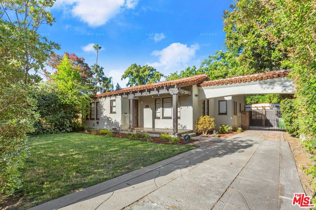 Virtual Tour: https://my.matterport.com/show/?m=2p2rvGDqpro / Video Tour: https://youtu.be/E_Dm3umP_BY / RENT AND TERMS: 1/2 months Free move-in special / Rent: 5,495/mo (move-in special reflected in advertised rent) / Security Deposit: $3,900 / Pet Rent: $75/mo / Lease term: 13 months ~ Enjoy your Newly REMODELED Mediterranean style 3 bed / 2 bath single family home, in the coveted Chandler Estates neighborhood of Sherman Oaks. ~ OPEN CONCEPT KITCHEN AND ENTERTAINER / FAMILY SPACE: Featuring an abundance of natural light, an impressive bright multi-purpose space with a fireplace focal point, an office nook, and hidden pantry, you'll enjoy the expansiveness and versatility of the huge open concept kitchen/den/dining room. Sitting at the large island complete with bar seating for 4 and stylish farmhouse sink, basking in the sunlight cascading through the 2 large skylights overhead, you'll never want breakfast to end. Your designer chef's kitchen features a huge 6 burner cook's stove/oven with hood, an abundance of quartz counter space and a more drawer/shelf/cabinet space then you'll ever need, along with your complete set of stainless steel appliances including a large French door refrigerator, dishwasher, and microwave ~ LIVING ROOM AND ENTRY: Grab a glass of wine, your favorite music, and kick up your feet. Free yourself of life's stress in your spacious Mediterranean style living room, accented by it's tall ceiling with recessed lighting, soft arches, and smooth skip trowel plaster walls. Entering under the arches of your large terra cotta tiled foyer, you are met with a wagging tail and smothered by licks and kisses from your best friend, who's been eagerly waiting for you to return all day ~ PRIVATE SPACES: With 3 well lit large bedrooms, and 2 thoughtfully oriented designer bathrooms, you can retire to your personal space with the privacy you need. The minimalist designed master suite, located off the beaten path, features a very large hidden walk-in closet, large windows and French doors with a view of the expansive backyard, a TV cleanly inset into the wall, and 2 wall sconces perfect for reading yourself to sleep. Shut out the world as you relax in the tub with wine and music in the big designer ensuite bathroom. Get some work done or play your favorite video game at the wall-to-wall-to-ceiling natural-design built-in desk in the large 2nd bedroom, then retire for the evening in your oversized bed under the tall ceiling. Finally, the 3rd bedroom is a real masterpiece. It's huge, and features a tall ceiling and door that opens out to the living room, making this space perfect to be used as regular bedroom, a guest bedroom, a nanny's bedroom, or repurpose as a multi-purpose room or playroom. The 2nd bathroom, centrally located next to both front bedrooms, the living room, and the kitchen, features an unusually large shower with bench. ~ YARDS W/ PATIO AND RAISED GARDEN: BBQ, sip a cool drink and relax, as you take in the warm summer valley nights from the rustic covered patio, overlooking your large grassy backyard. Step up into your raised planter and get your hands dirty planting your favorite garden vegetables and herbs. With the privacy of the bushes separating the large front yard from the public space, play catch with the dog or kids without the scrutiny of the public's eye ~ LARGE 2 CAR GARAGE WITH BUILT IN SHELVING: Want to keep your luxury or collectors car out of the elements or have the perfect work space for your DIY projects, this very large 2 car garage with built in shelving has the versatility your looking for. Enjoy the long drive for the extra car parking or use as overflow yard space ~ EXTRAS: Laundry room w/ lots of utility/linen cabinetry and a new stacked front-loading washer and dryer, recessed lighting throughout, archways galore, multiple nooks and inset shelves, Ring doorbell, central A/C & heat w/ smart therm