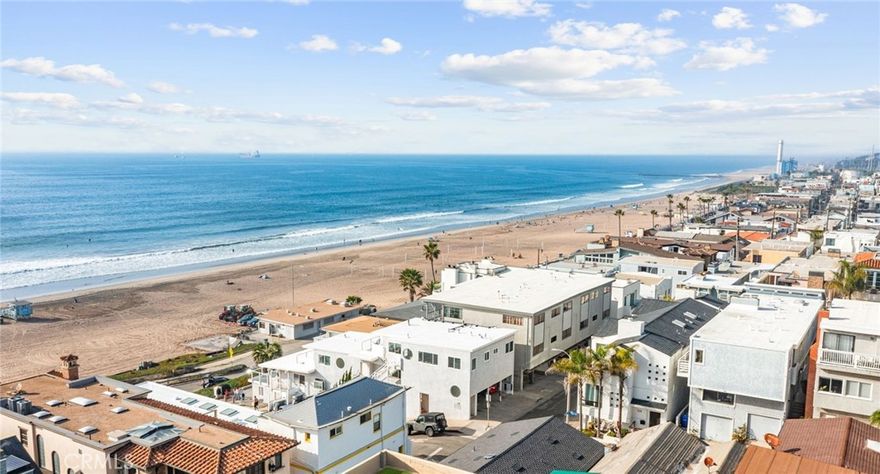Experience Manhattan Beach living at its finest in this stylish home, located just steps from the sun-kissed sands and iconic Strand. This spacious unit features 2 bedrooms, PLUS a bonus room perfect for an office or additional sleeping quarters, offering breathtaking ocean views and unmatched sunsets right from your living room. Enjoy a seamless blend of indoor and outdoor living with the prime location providing easy access to vibrant shopping, great dining, and all the wonderful things MB has to offer. The attached garage offers secure parking, ideal for beach cruisers and weekend adventures. Whether you're savoring the ocean breeze or strolling along the beach, this home epitomizes coastal life. Embrace the perfect balance of modern amenities and beachside charm. Don’t miss the opportunity to live near everything you love about this vibrant community!