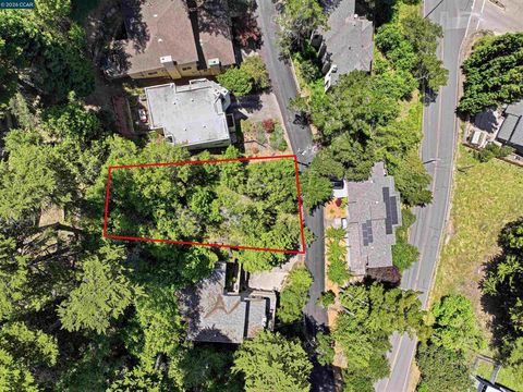 Photo of 6690 Gunn Dr Dr, Oakland, CA 94611 (MLS # 41137710)