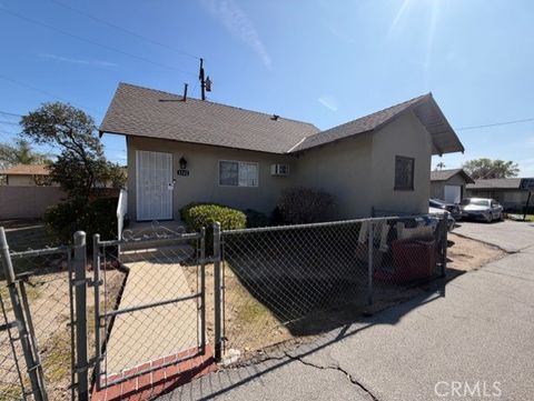 Photo of 1242 W Orange Grove Ave, Pomona, CA 91768 (MLS # CV26043870)