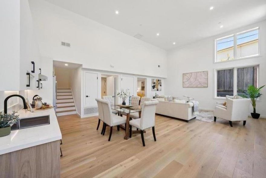 Experience modern luxury at The Flora  Burlingame's newest 8-unit boutique condominium. Unit 1 is the only ground-floor residence featuring an expansive private garden and patio, perfect for outdoor entertaining or quiet relaxation. Inside, enjoy high ceilings, wide-plank wood flooring, and abundant natural light throughout. The chef's kitchen offers quartz countertops, custom cabinetry, and high-end appliances, while the elegant bathrooms provide a spa-like touch. With 2 spacious bedrooms, 2 bathrooms, in-unit laundry, and conveniently located deeded parking, this home blends style, function, and indoor-outdoor living, all just steps from vibrant downtown Burlingame and Caltrain.