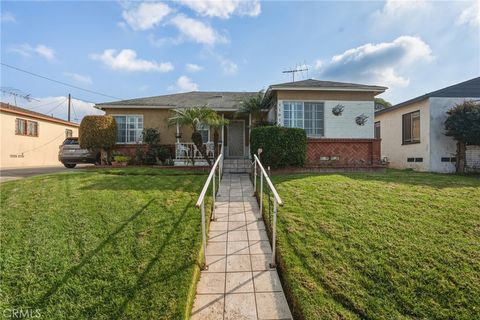 Photo of 11016 S, VAN NESS Ave, Los Angeles, CA 90047 (MLS # SB26013050)