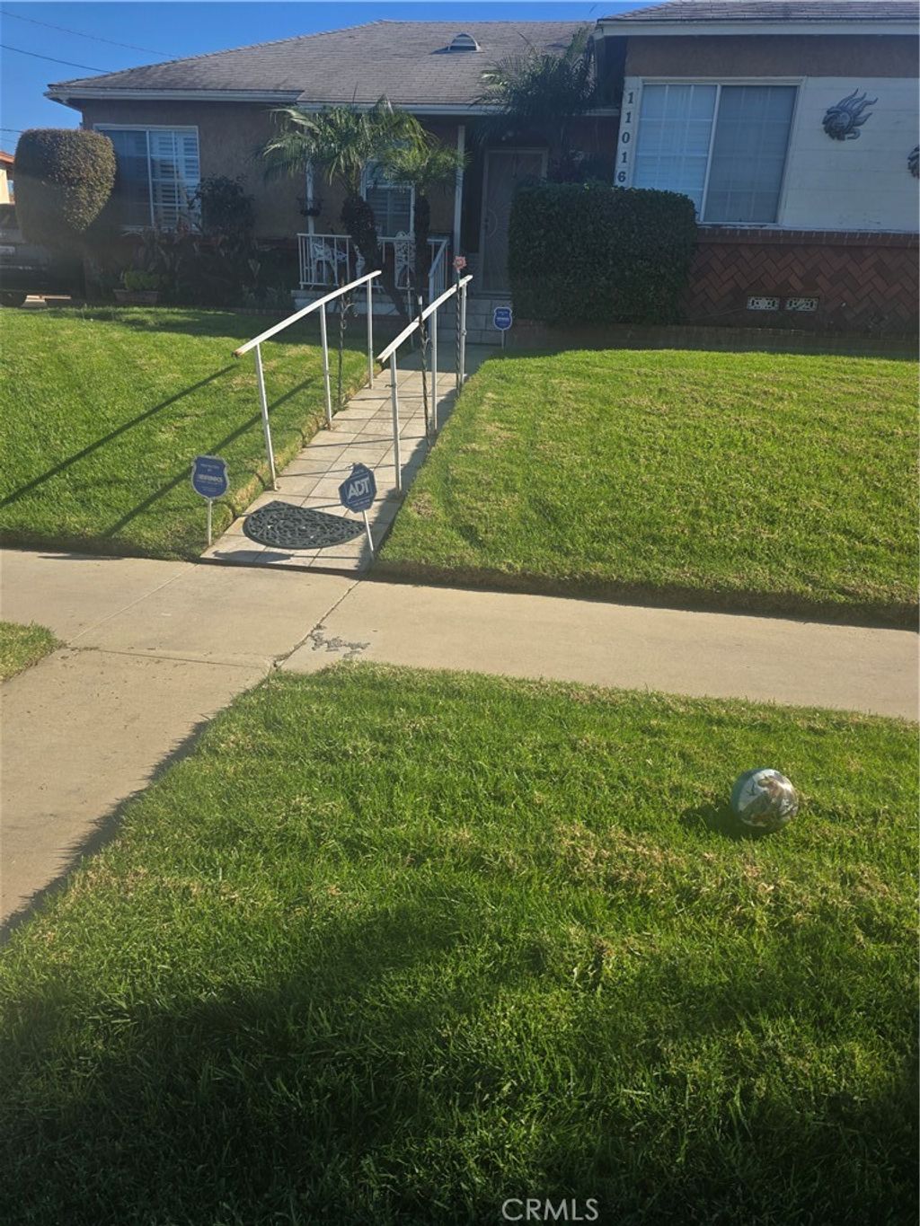 Photo of 11016 S, VAN NESS Ave, Los Angeles, CA 90047 (MLS # SB26013050)