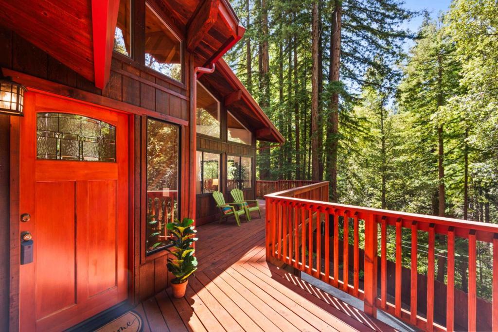 Step into this beautifully renovated Bonny Doon hideaway and feel the magic instantly. The soaring open beam ceilings and expansive windows create a sense of space while framing incredible forest views that become part of daily life. The sun drenched brand new kitchen features modern touches like under-cabinet lighting, spacious pantry, center island, plus new appliances and flooring. All new bathrooms complete the home's fresh updates. The primary suite serves as a peaceful haven with a walk-in closet, beautiful shower, and amazing forest views. The wrap-around redwood deck invites countless hours of relaxation, with new decks and stairs complementing this meticulously remodeled home, renovated inside and out. Every detail has been carefully considered: new well pump, septic upgrades, water filtration system, efficient on-demand heating. Here's what makes this property truly special - acres of established trails right outside the door, with endless opportunities to create a personal hiking network connecting to adjacent public lands. Whether enjoying quiet mornings on the deck or exploring the wilderness, this home offers the perfect balance of modern comfort and outdoor adventure. Potential ADU and camping locations too. This is mountain living at its finest.