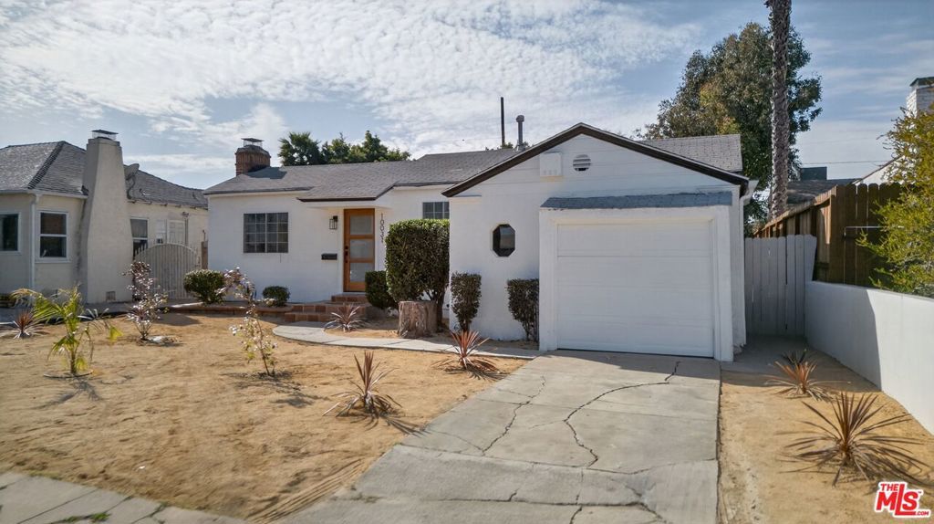 Photo of 10031 S Harvard Boulevard, Los Angeles, CA 90047 (MLS # 26646611)