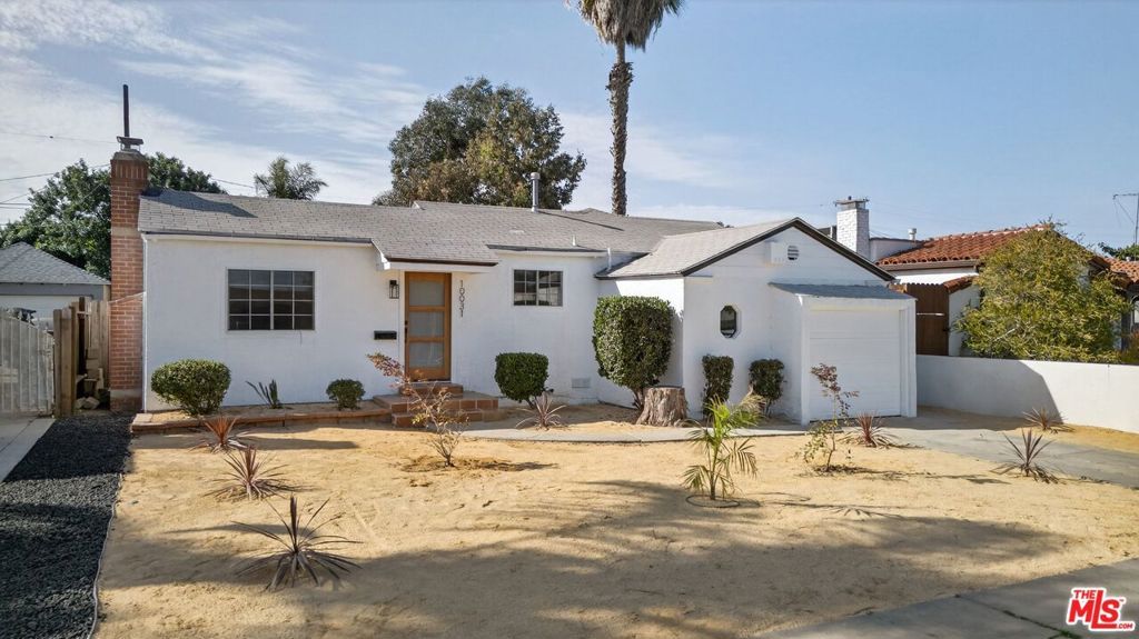 Photo of 10031 S Harvard Boulevard, Los Angeles, CA 90047 (MLS # 26646611)