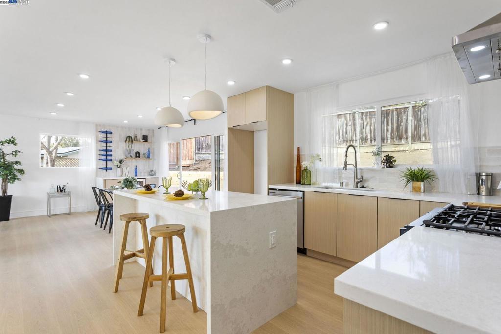 Welcome To This Beautifully Renovated 5-Bedroom, 4-Bathroom Home In The Highly Sought-After, Seven Hills Neighborhood Of Union City. Offering Over 2,000 Sq Ft Of Open-Concept Living With Views of the Bay, This Home Is Designed For Both Comfort And Entertainment. Three Of The Five Spacious Bedrooms Are En-Suite, Each With Their Own Luxurious Bathrooms, Cladded In Tile And Stone Finishes. Engineered Hardwood Flooring Runs Throughout The Home Giving The Durability of Hardwood Alongside a Scratch and Water Resistant Finish. The Brand-New Kitchen Boasts Custom European Cabinets, Quartz Countertops, And Top-Of-The-Line Appliances. A Dedicated Minibar And Wine Fridge Are Sure To Keep The Entertainment Going! Step Outside Into The Fully Finished Backyard Retreat, Complete With Lush Artificial Grass, Diamond-Patterned Concrete, And A Large Deck Offering Stunning Panoramic Views Of The Bay Area. Both The Front And Back Yards Are Low-Maintenance, Allowing You To Enjoy The Beauty Of Your Surroundings Without The Upkeep. Conveniently Located With Easy Access To I-880/238 And Mission Blvd, This Home Is The Perfect Blend Of Luxury And Convenience. Turn Key & Ready For its New Owner! 3D TOUR AVAILABLE: https://my.matterport.com/show/?m=fBbbuptvUfd&brand=0&mls=1&