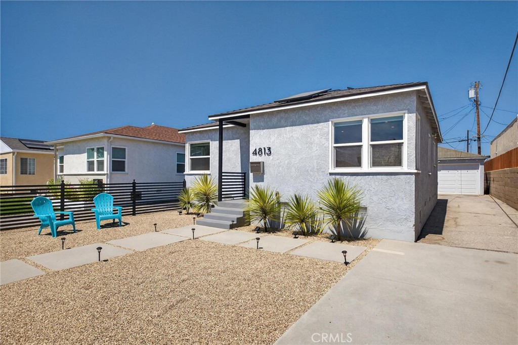 Welcome to your California dream home! This beautifully renovated single-story charmer combines modern style with smart living features that'll make you fall in love. From the moment you step inside, you'll appreciate the open, airy vibe with gleaming hardwood floors and tons of natural light. The gorgeous kitchen is a showstopper with sleek granite counters, coffee bar area, and stainless appliances, perfect for whipping up meals and entertaining friends.
Two spacious bedrooms provide plenty of room to spread out, while the updated bathroom will surely make your guests say 'wow!' The separate laundry room comes equipped with high-end Samsung appliances because, yes, doing laundry can be luxurious!
The fully gated property is your own private oasis with modern concrete paths, mood-setting string lights, and drought-smart landscaping to create the ultimate outdoor entertainment space. Plus, a new roof with solar and efficient mini-split AC systems keep your energy bills in check while keeping you comfortable year-round. Bonus, EV charger installed. Go Green!
Located in the highly-rated Wiseburn School District, this home offers the perfect blend of suburban peace and urban convenience. You're just minutes from pristine beaches, great shopping, diverse dining, and everything the South Bay has to offer. Don't miss this turnkey gem, it's the perfect place to call home!
4813 W 130th st can be sold fully furnished! Just bring your clothes.
